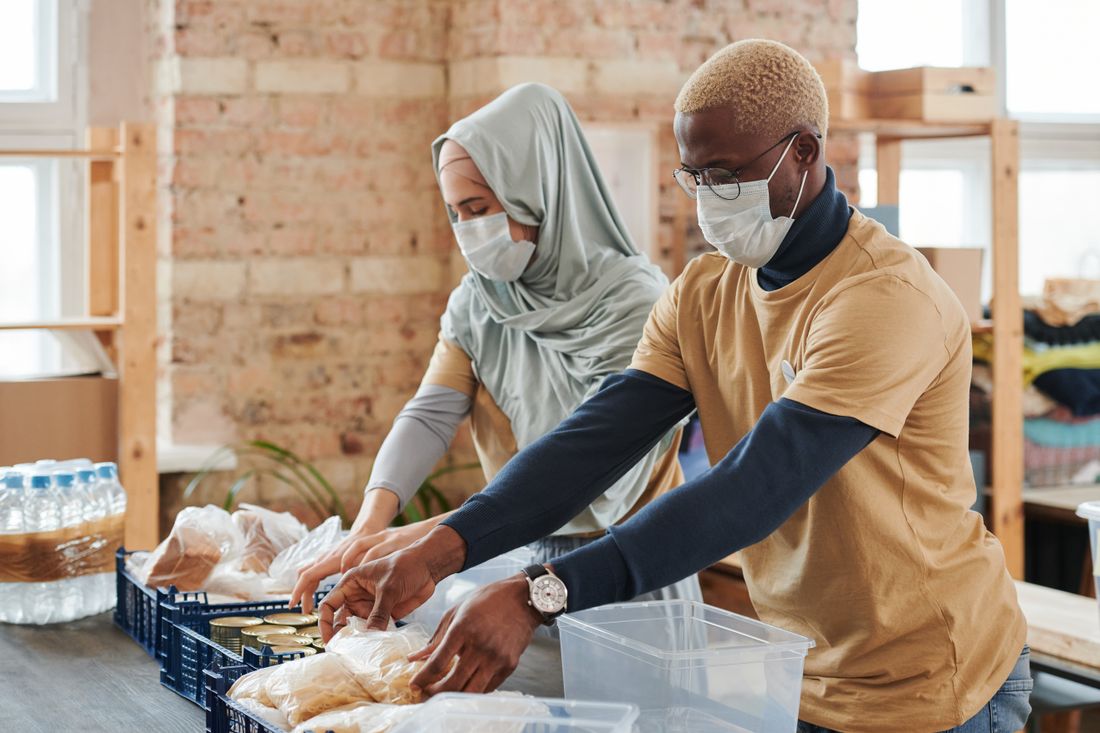 Volunteers preparing food donations
